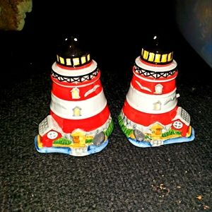 Ceramic (I believe) lighthouse salt & pepper shakers